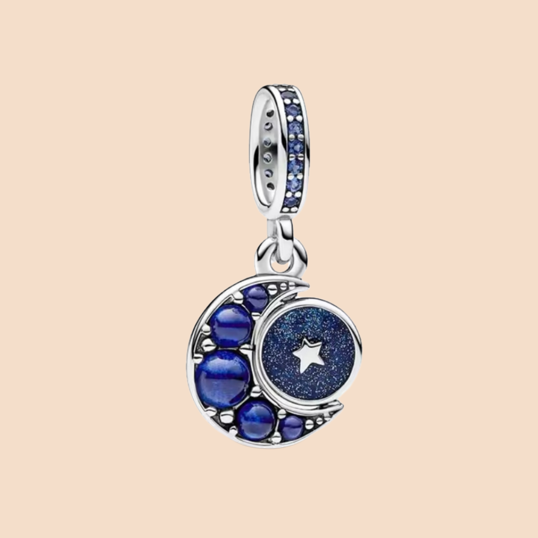 Charm luna con piedras azules y estrella colgante