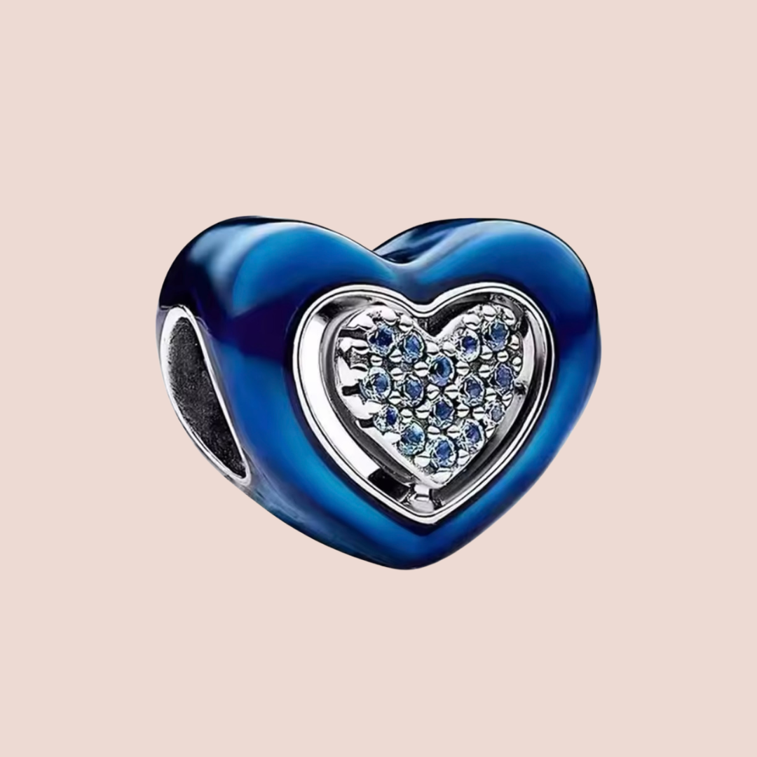 Charm corazón azul con corazón adentro con piedras