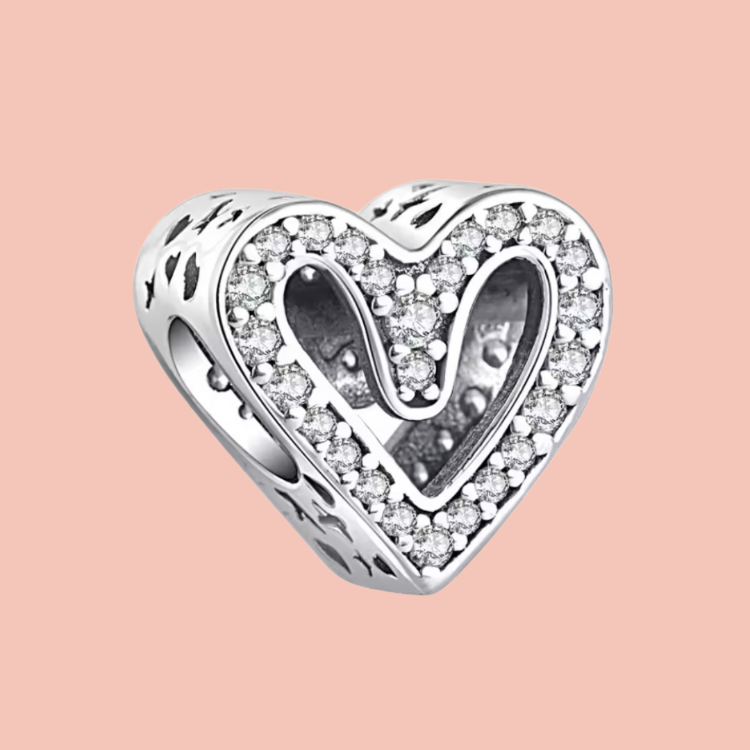 Charm corazón plata con piedras platas alrededor