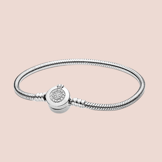 Pulsera rígida broche redondo con piedras plata