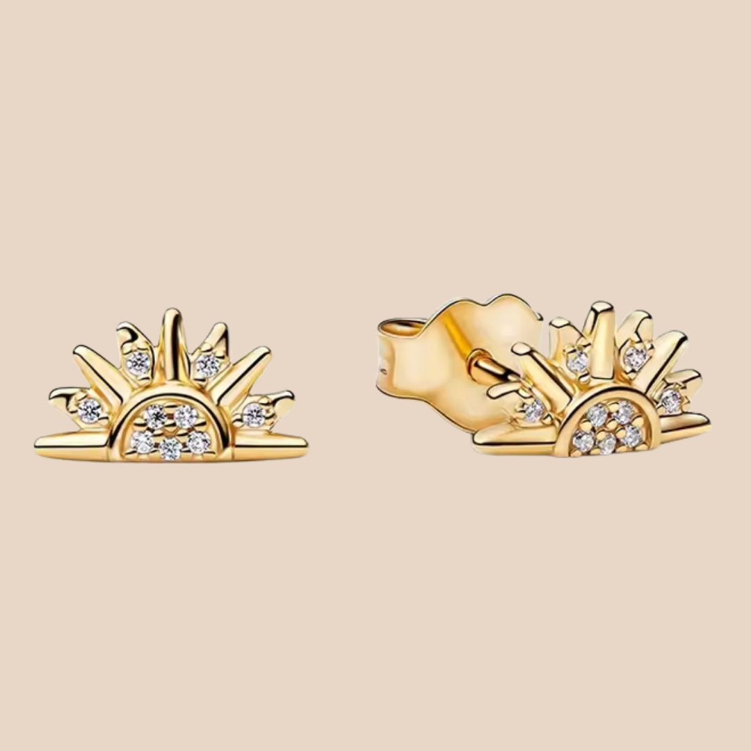 Aretes dorados con forma de sol