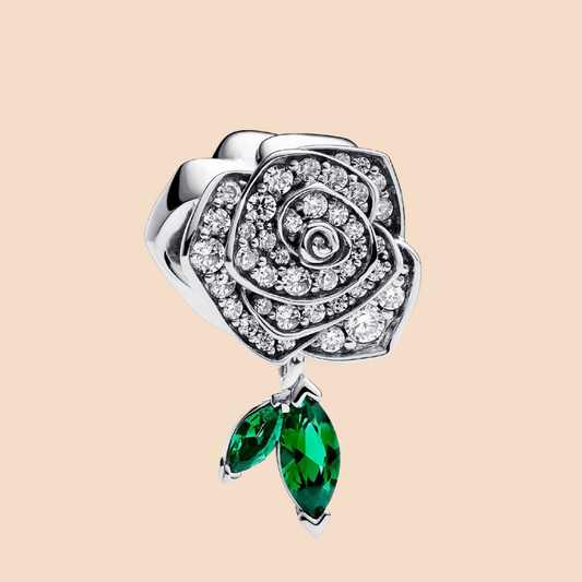 Charm flor plata con hojas verdes