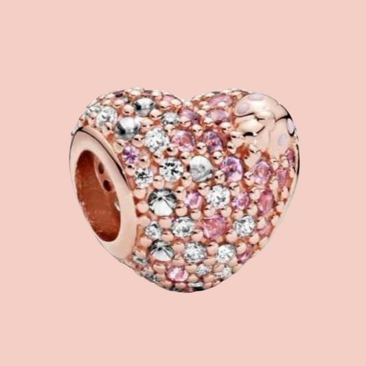 Charm corazón oro rosa con piedras platas y rosas