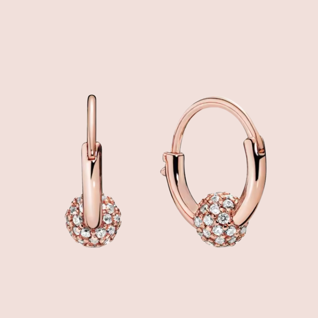 Arracadas pequeñas oro rosa con piedras al centro