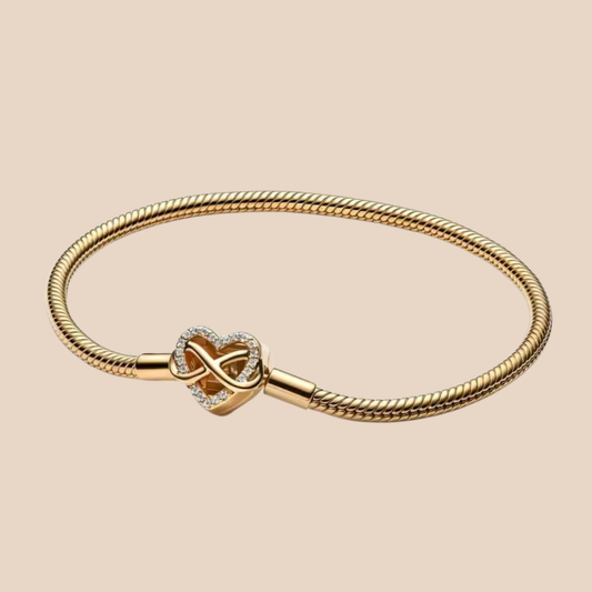 Pulsera dorada corazón con infinito