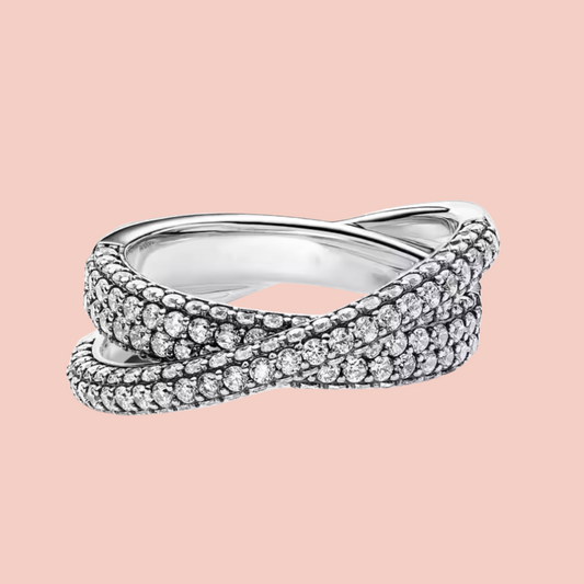 Anillo dos aros enlazados con piedras plata