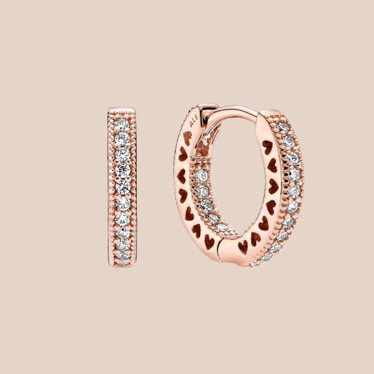 Arracadas pequeñas oro rosa con piedras plata