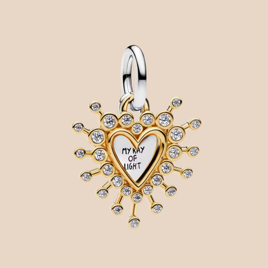 Charm corazón plata con dorado leyenda "My ray of light"