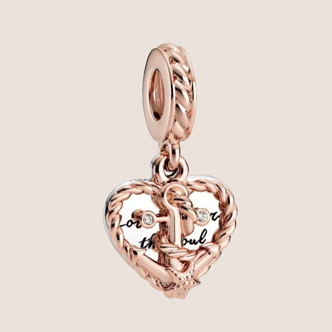 Charm corazón con ancla plata con oro rosa Leyenda "Love anchors the soul"