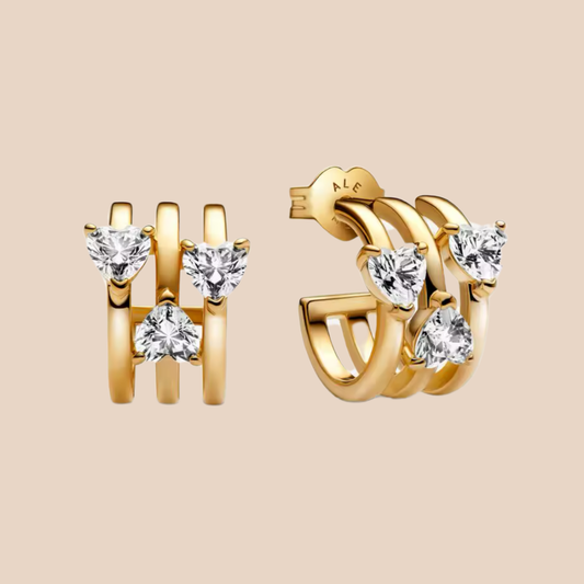 Aretes dorados tres aros con corazones