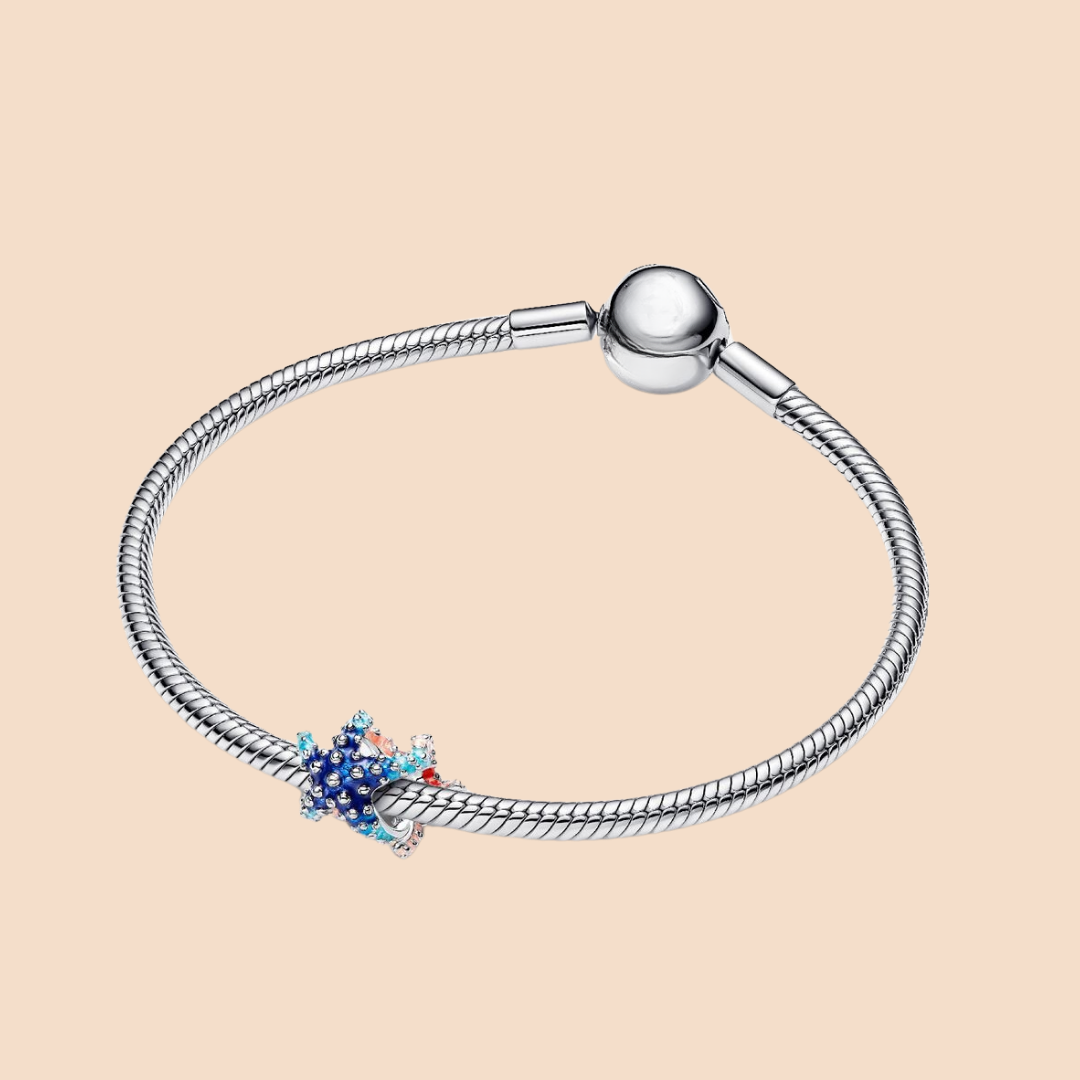 Charm estrella de mar azul y naranja